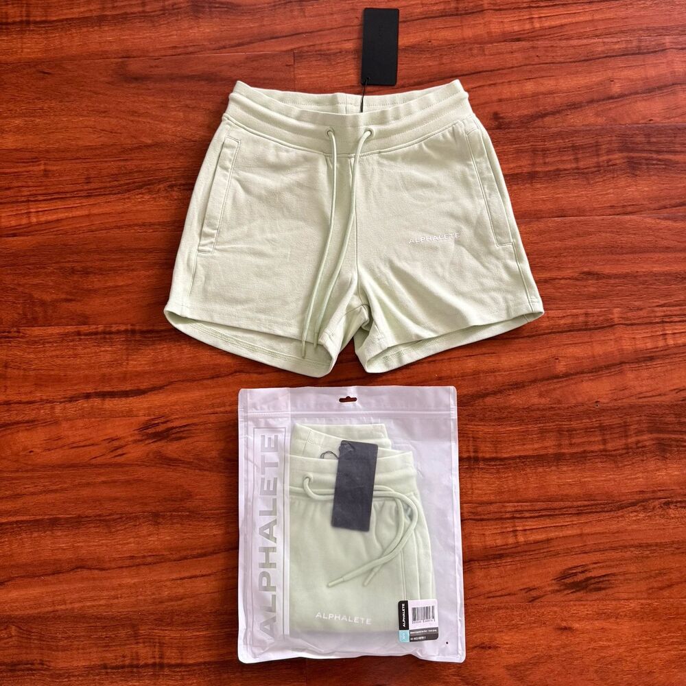 NWT Alphalete Womens S Essential Core Sweat Shorts Spring Green Zipped Pockets